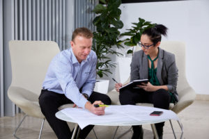 Grosvenor engineers looking at plans